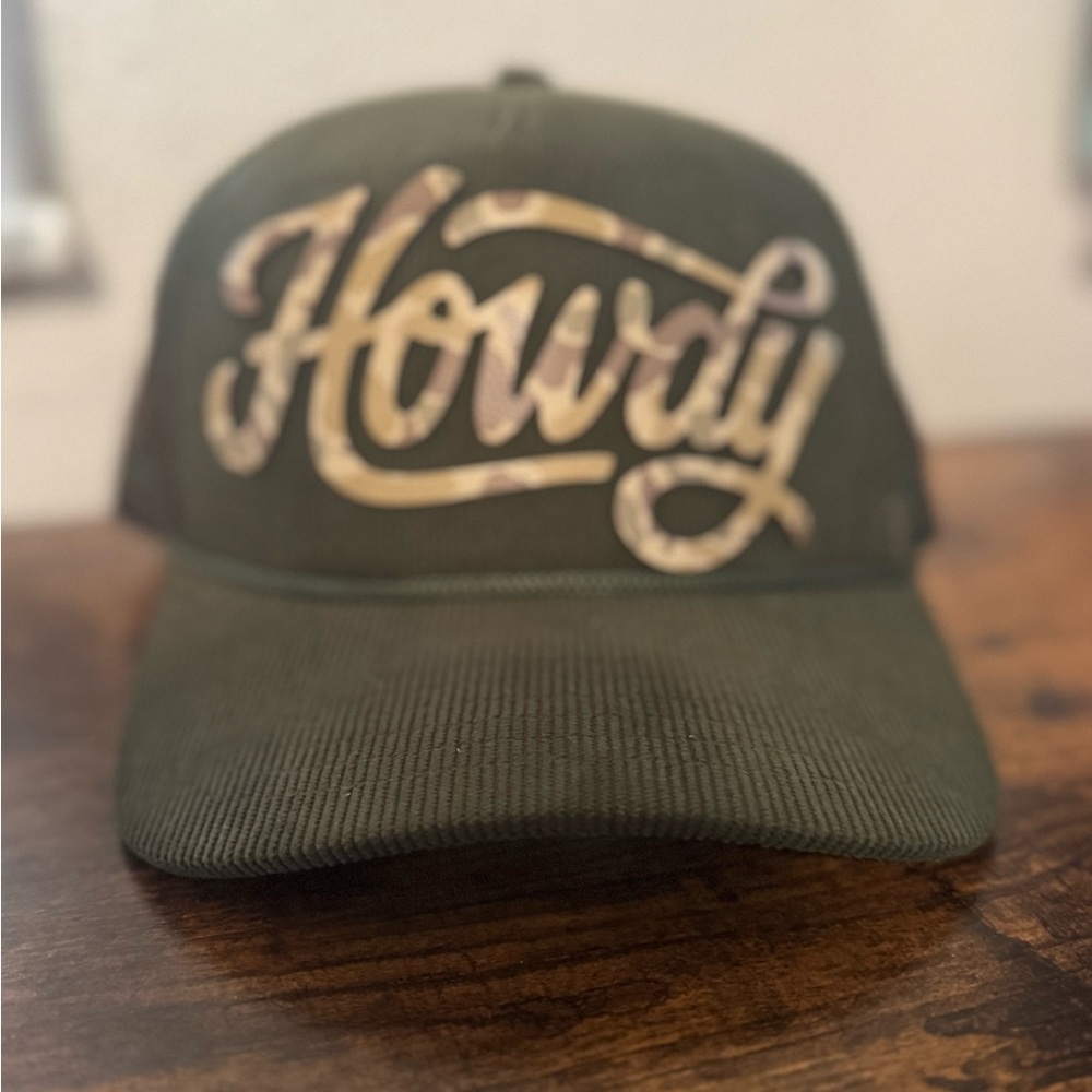 Olive Green corduroy back is camo Trucker hat with  'Howdy' leather patch